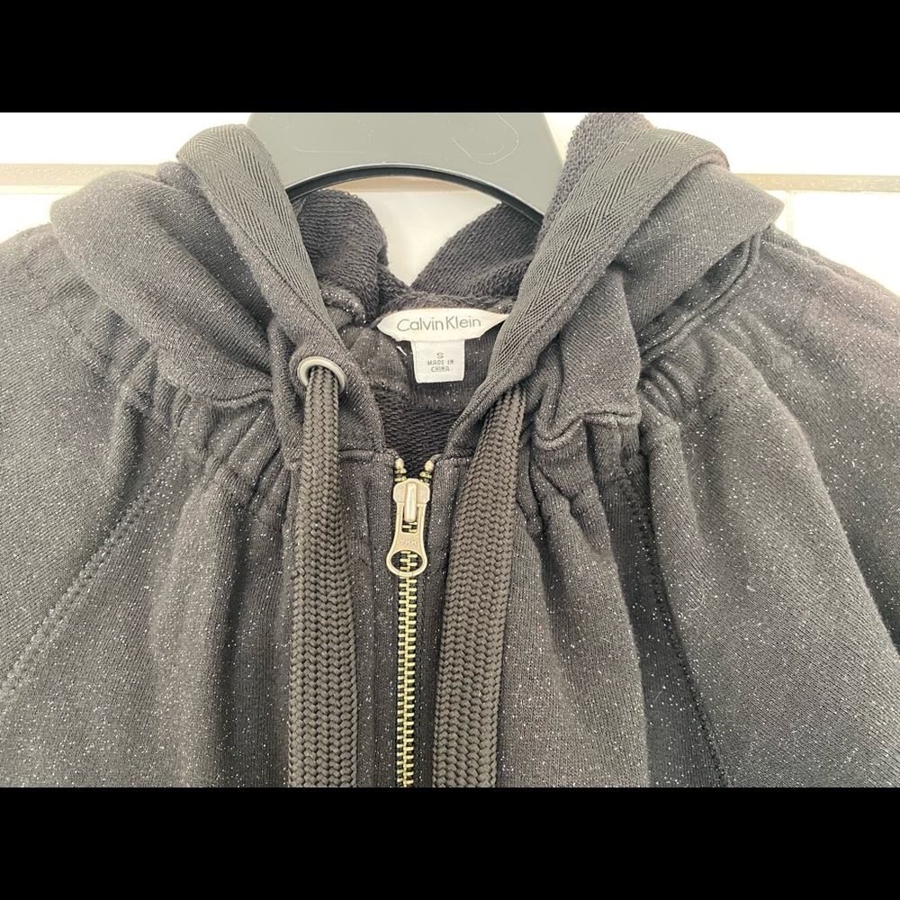 Calvin Klein zip up hoodie with 3/4 sleeves. Fun and dressy!